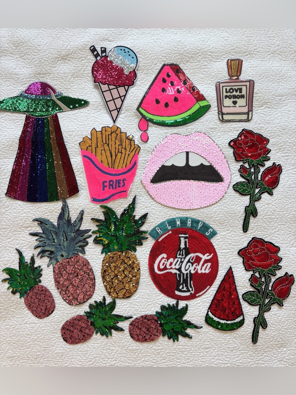 Collection of sew on + iron on sequin patches